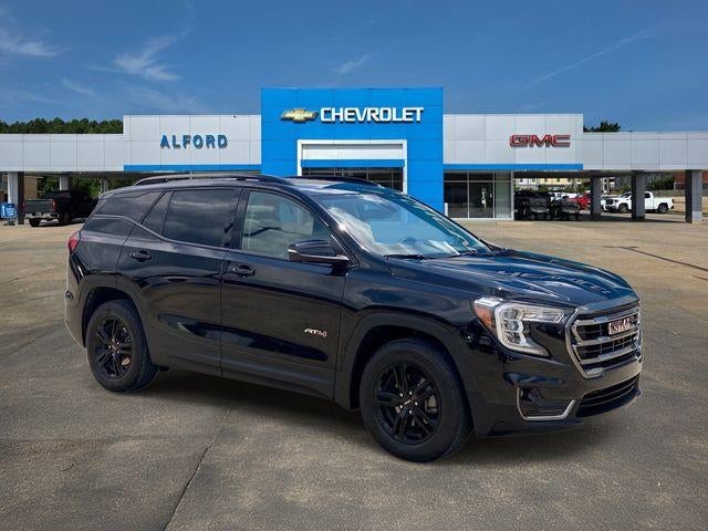 2024 GMC Terrain AT4 in Ebony Twilight Metallic — front three-quarter view